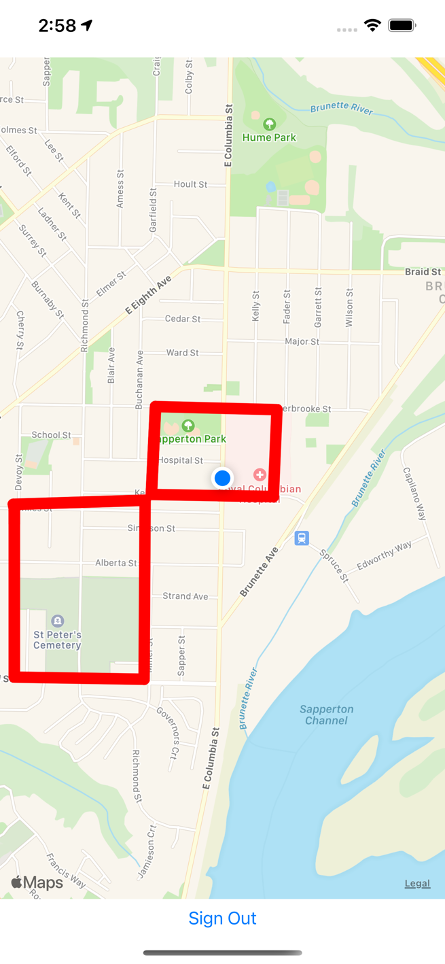 The image displays a mobile app where the user is represented as a center blue point, geofences are shows as red polygons in the map. The user is inside the geofence.