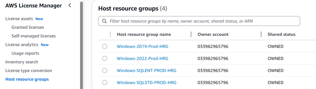 AWS License Manager console displaying the Host resource groups interface. The left navigation panel shows License assets menu with Granted licenses and Self-managed licenses options, plus License analytics, Usage reports, Inventory search, License type conversion, and Host resource groups highlighted. The main panel shows a table listing four host resource groups: Windows-2019-Prod-HRG, Windows-2022-Prod-HRG, Windows-SQLENT-PROD-HRG, and Windows-SQLSTD-PROD-HRG. Each entry displays the host resource group name, owner account 033982965796, and shared status marked as OWNED. A search filter at the top allows filtering by name, owner account, shared status, or ARN