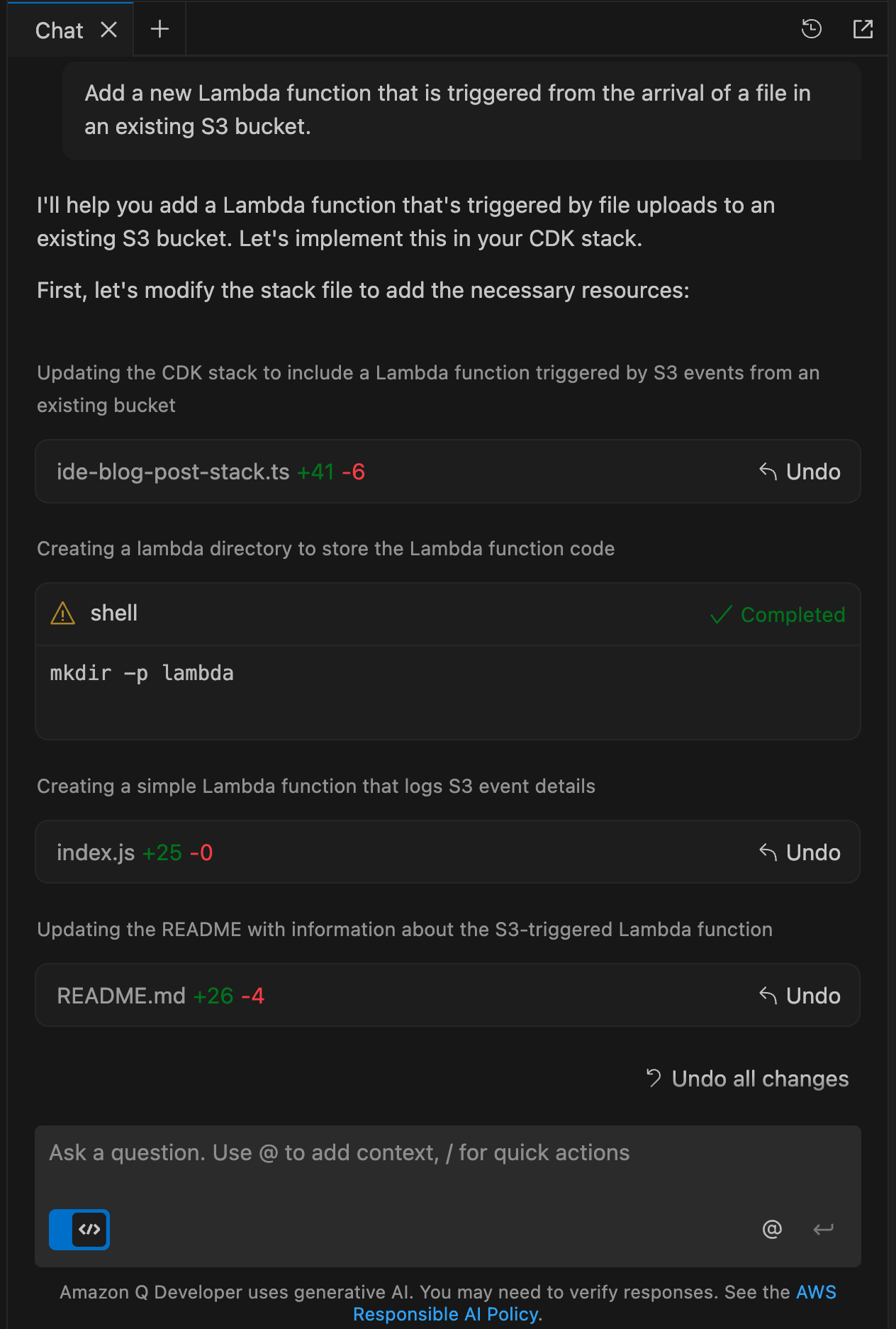 A screenshot of an Amazon Q Developer chat interface showing instructions for adding an S3-triggered Lambda function to an existing CDK stack. The interface displays several steps being executed: modifying the stack file (ide-blog-post-stack.ts with +41/-6 changes), creating a lambda directory using the "mkdir -p lambda" command (marked as completed), creating a Lambda function in index.js (+25/-0 changes), and updating the README.md file (+26/-4 changes). Each modification shows an "Undo" option, and there's an "Undo all changes" button at the bottom. The interface features a dark theme and includes the standard input field and AI disclosure notice at the bottom.