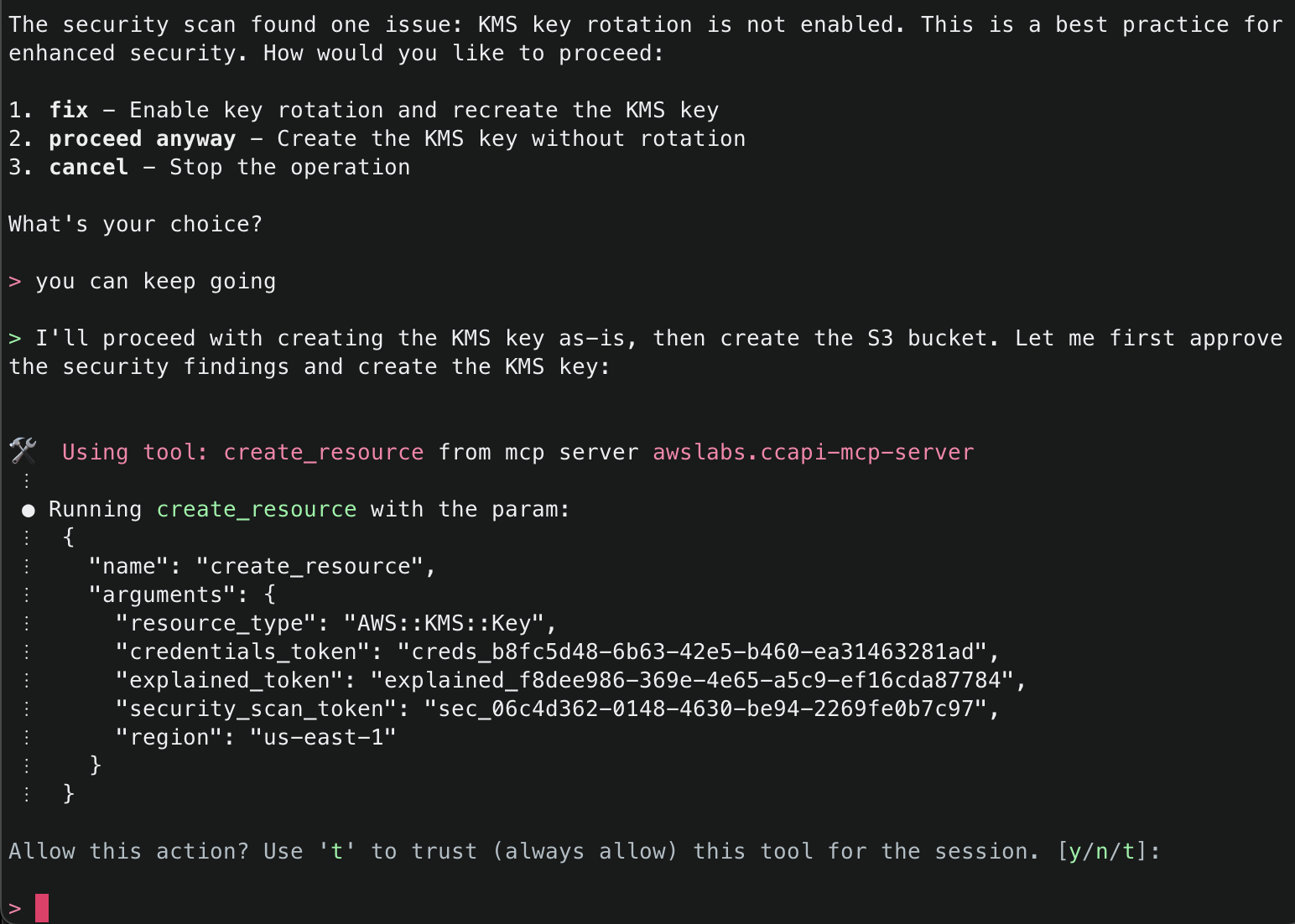 User responds 'you can keep going' and Claude proceeds with creating KMS key as-is. Shows 'create_resource' tool execution with resource type, credentials, and security scan tokens.