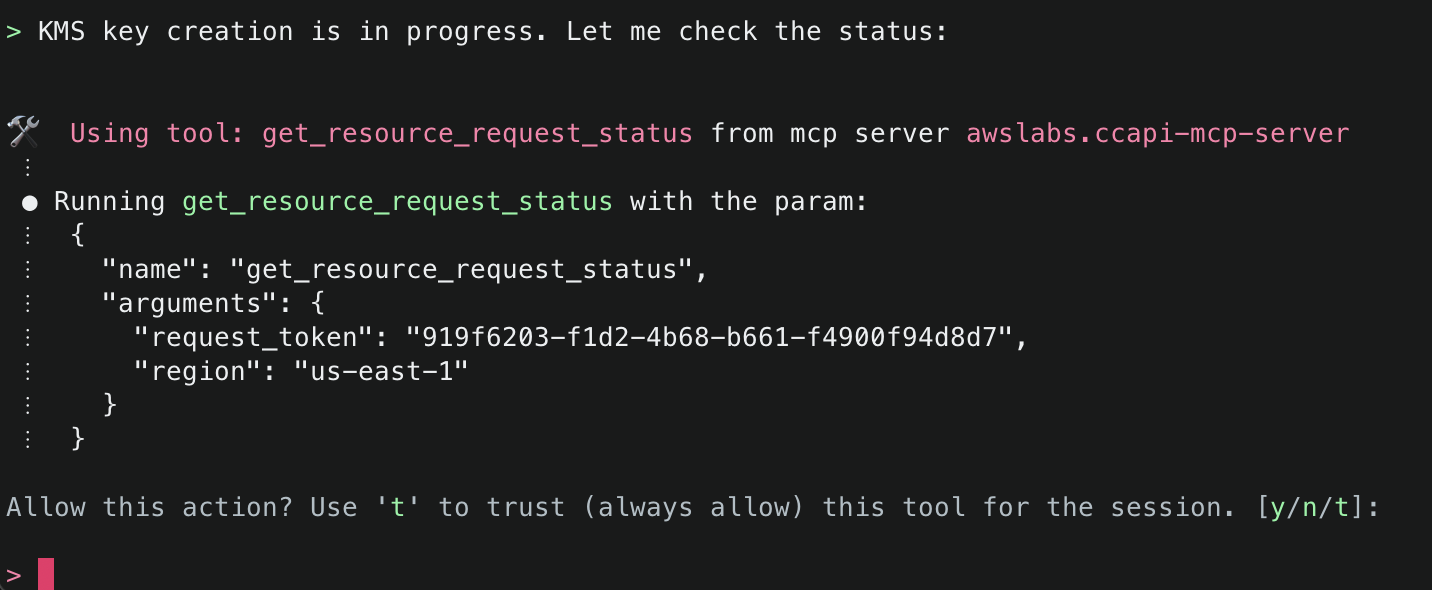 KMS key creation in progress message followed by 'get_resource_request_status' tool usage with request token to check the status.