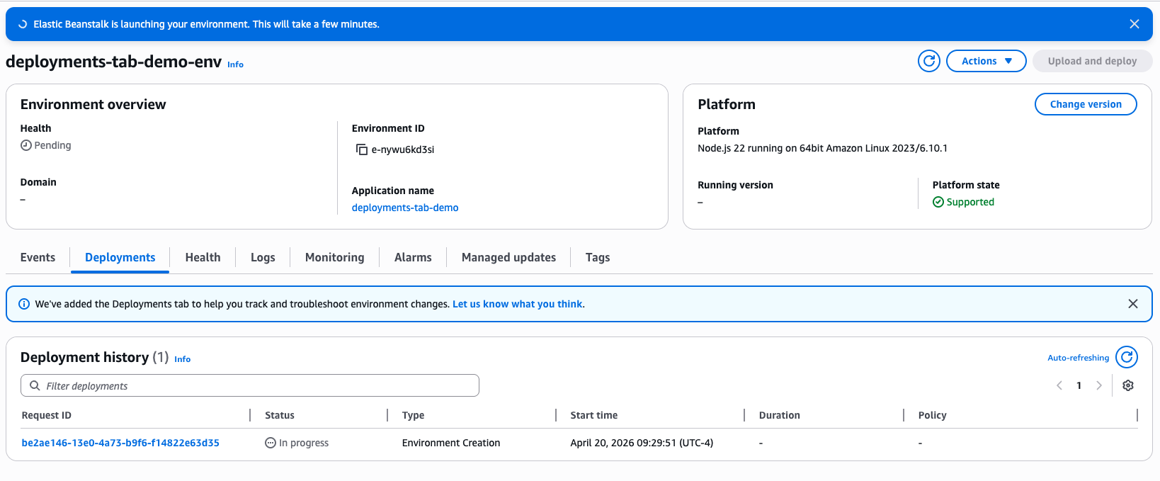 Elastic Beanstalk environment overview page showing the new Deployments tab selected, with a Deployment history table listing one in-progress Environment Creation deployment.