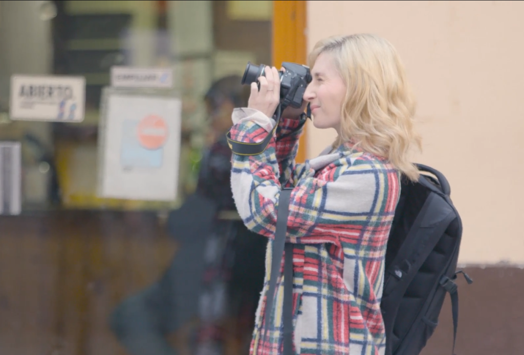 photo of Diana taking a picture with her DSLR camera