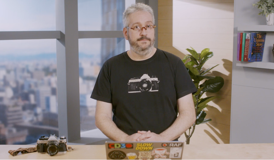 Person sitting in front of a laptop