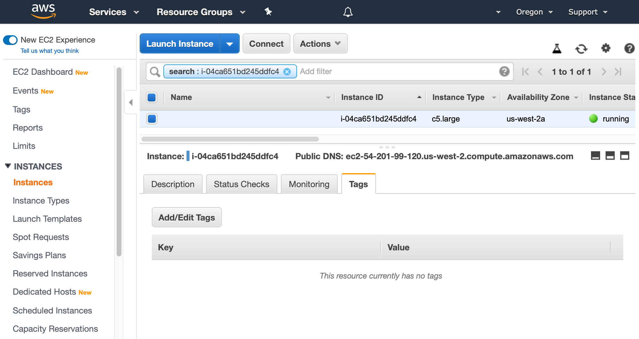 AWS Management Console shows EC2 Instances view. On the lower pane, the Tags tab is selected. This resource currently has no tags.