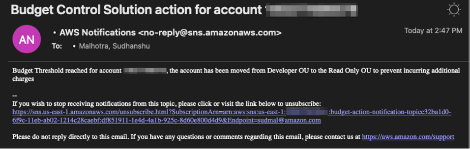 The notification from AWS Notifications says the budget threshold for the account has been reached and the account has been moved from Developer OU to the Read Only OU to prevent incurring additional charges. 