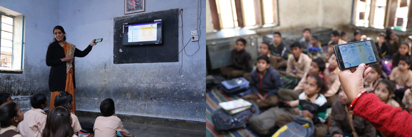 Figure 1. A teacher using smart classroom and Pragyan app in their classroom.