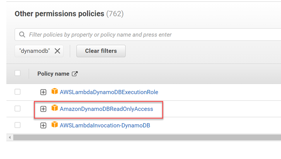 Attach policy page for ""lambda_exec_TMDBAlexaSkill" in AWS Console. Policy name "AmazonDynamoDBFullAccess" highlighted