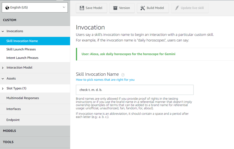 In Custom Skill Configuration in Alexa Developer Console. Invocations option is expanded, Skill Invocation Name configuration page open. Skill Invocation Name is populated with "check t. m. d. b."