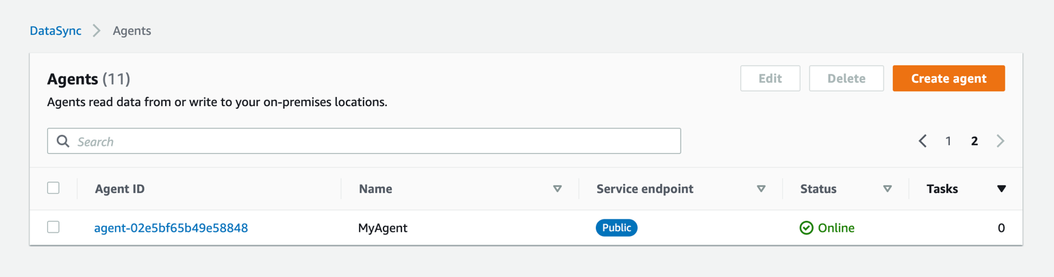 The AWS Management Console lists the newly activated agent along with its agent ID.