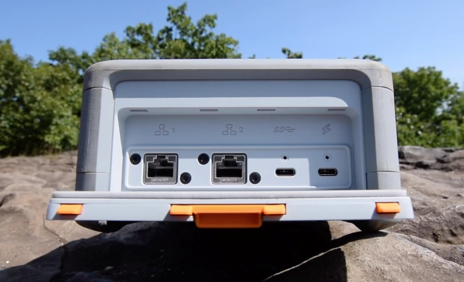 Open the rear panel of the Snowcone and connect the USB-C power source.