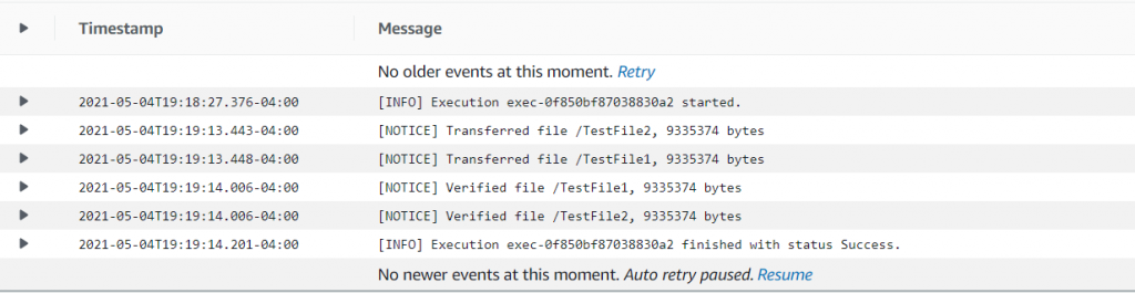 CloudWatch Logs for the DataSync task confirm that the two files were successfully transferred and verified