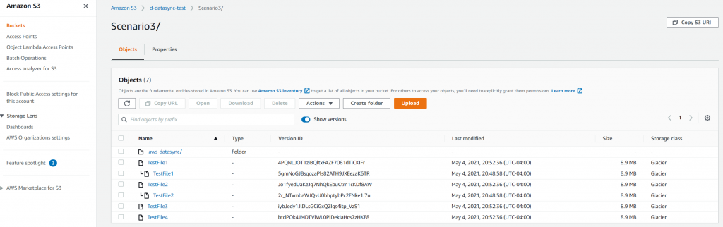 The S3 console shows that there are two versions of the previously transmitted files, and only one version of the new files (1)