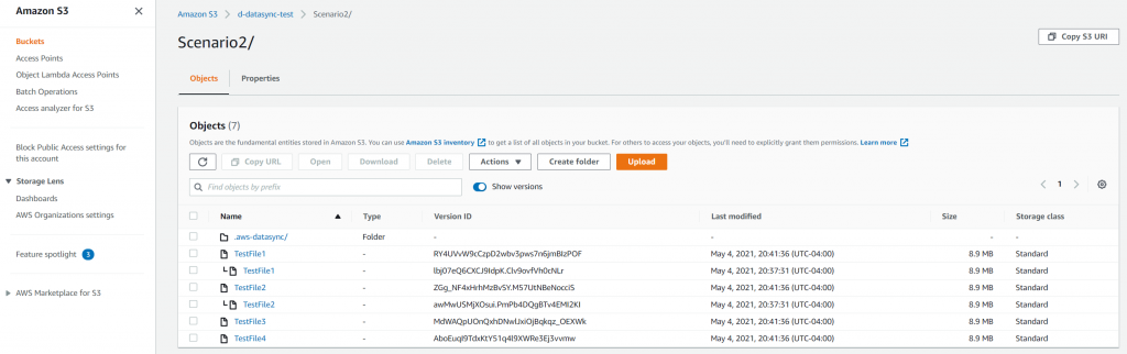 The S3 console shows that there are two versions of the previously transmitted files, and only one version of the new files