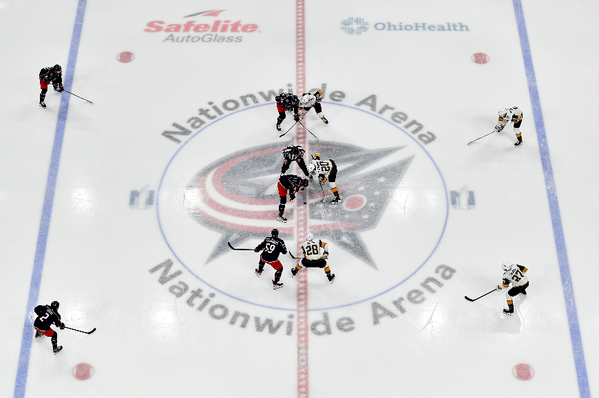 An NHL faceoff shot from up top