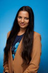A headshot of Pooja