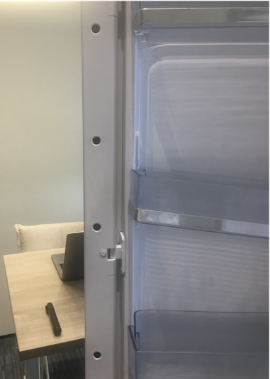 This image shows the connected refrigerator powered by AWS IoT that uses an Android tablet on a refrigerator door to provide an end user interface and several cameras installed on the inside of the refrigerator door.