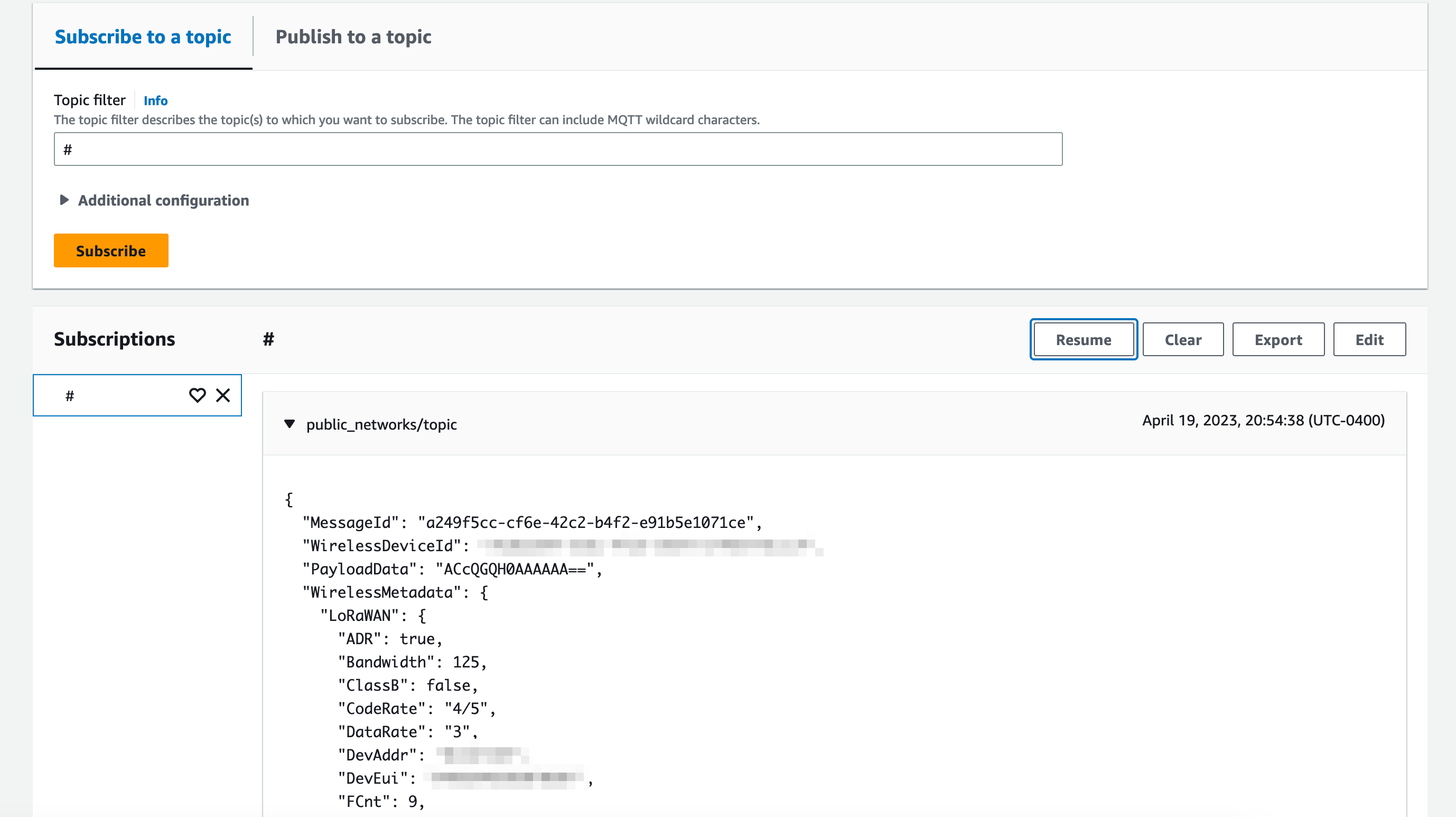 AWS IoT Core MQTT test client showing that the test client is subscribed to the wild card topic # and has received data from the AWS IoT Core for LoRaWAN service. The data is showing in the subscriptions page as a json message on the topic public_networks/topic.