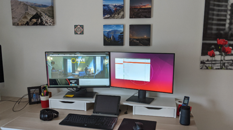 Two computers in a remote workspace displaying Hive VFX interface
