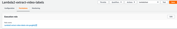 A screenshot of Lambda's console window showing execution role and the role name.
