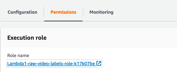 A screenshot of Lambda's console window demonstrating execution role and the role name.