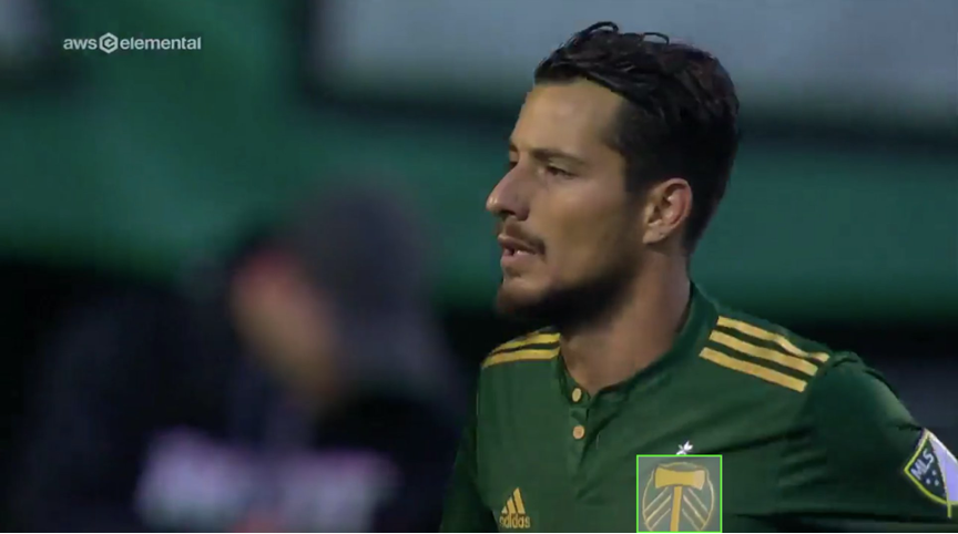 Extracted frame with team logo clearly visible on players jersey 